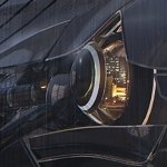 A futuristic close-up of a sci-fi vehicle's headlight, showcasing advanced technology and sleek design, serves as a striking avatar for a forum profile.