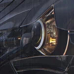 A futuristic close-up of a sci-fi vehicle's headlight, showcasing advanced technology and sleek design, serves as a striking avatar for a forum profile.