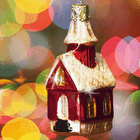 A festive Christmas-themed forum avatar featuring a small decorative house ornament with colorful, blurred holiday lights in the background.
