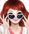 Illustrated red-haired woman in heart-shaped sunglasses, hands framing her face with a playful smile against a pink, heart-dotted background — forum avatar/profile photo.