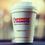 Close-up of a Dunkin' Donuts coffee cup with logo, perfect as a social media avatar or profile picture.