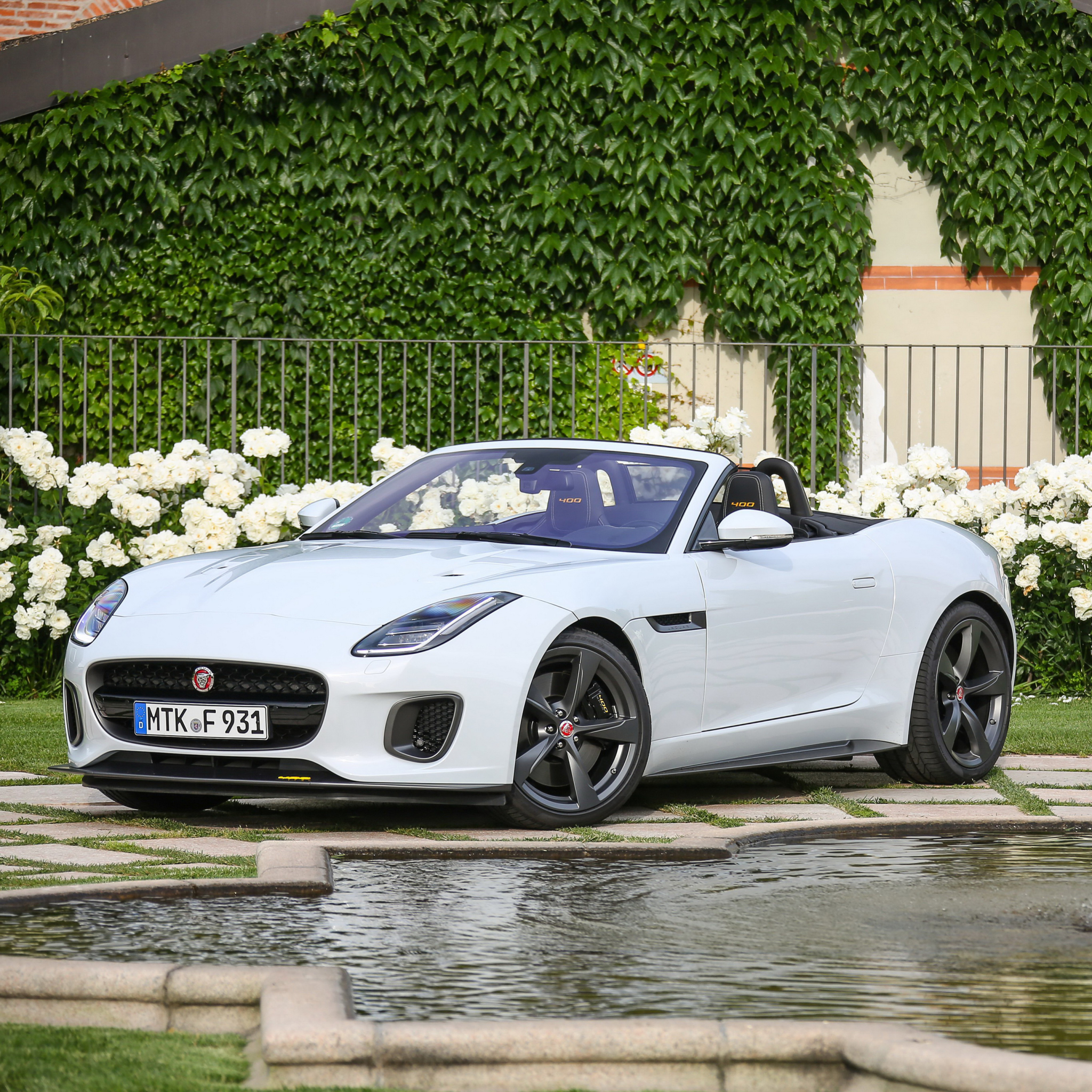 Jaguar F-Type next to a Fountain