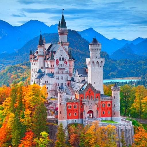 Neuschwastein Castle surrounded with autumn colours by Rudy Balasko