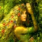 Forum avatar/pfp of a fantasy nature goddess: flower-crowned, leaf-entwined woman with golden skin and luminous eyes, bathed in verdant, glowing foliage.