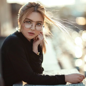bokeh brunette model glasses woman PFP
