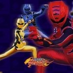 Forum avatar/profile photo from the Power Rangers TV show: dynamic artwork of blue, yellow, and red Rangers striking action poses with the Power Rangers logo on a dark background.