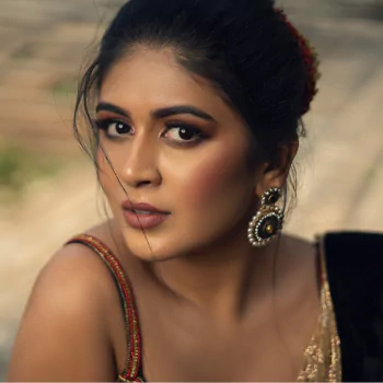 brown eyes earrings face black hair Raksha Somashekhar Bollywood actress Indian woman PFP
