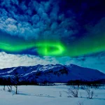  Aurora Borealis over Winter Mountains