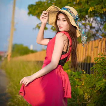 red dress hat depth of field long hair brunette asian model woman PFP