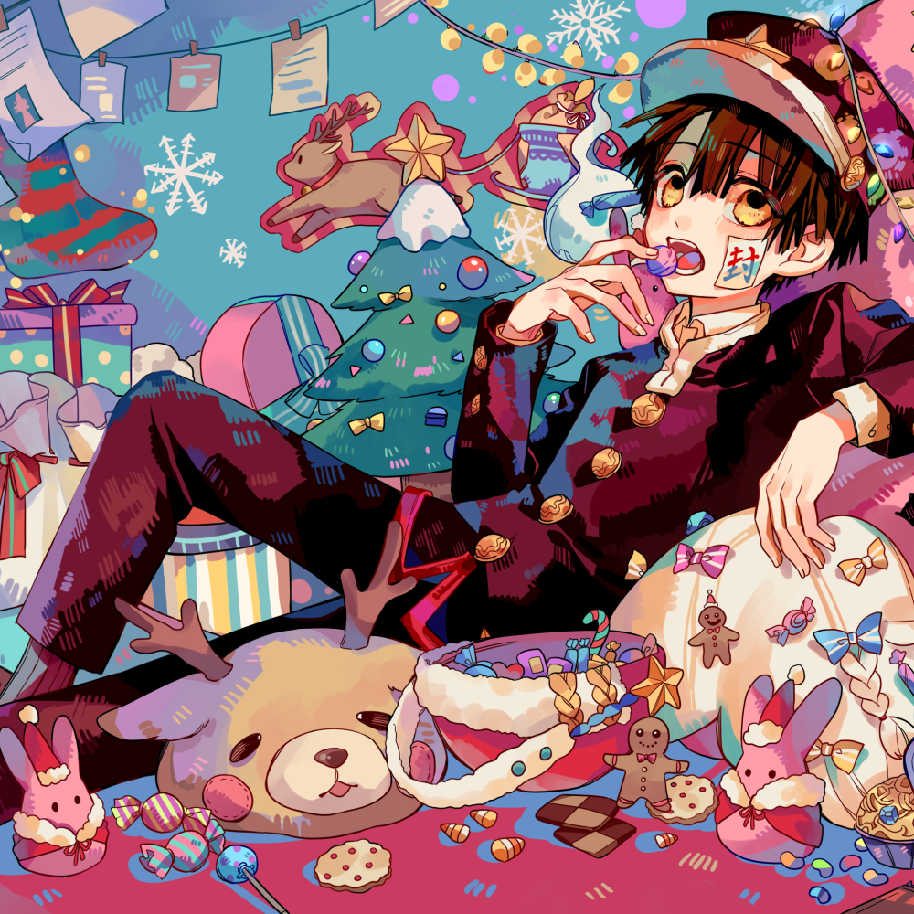 Festive anime forum avatar/pfp of Hanako-kun (Toilet-bound Hanako-kun) lounging among sweets, presents and a plush reindeer by a decorated Christmas tree, wearing his school uniform and hat.