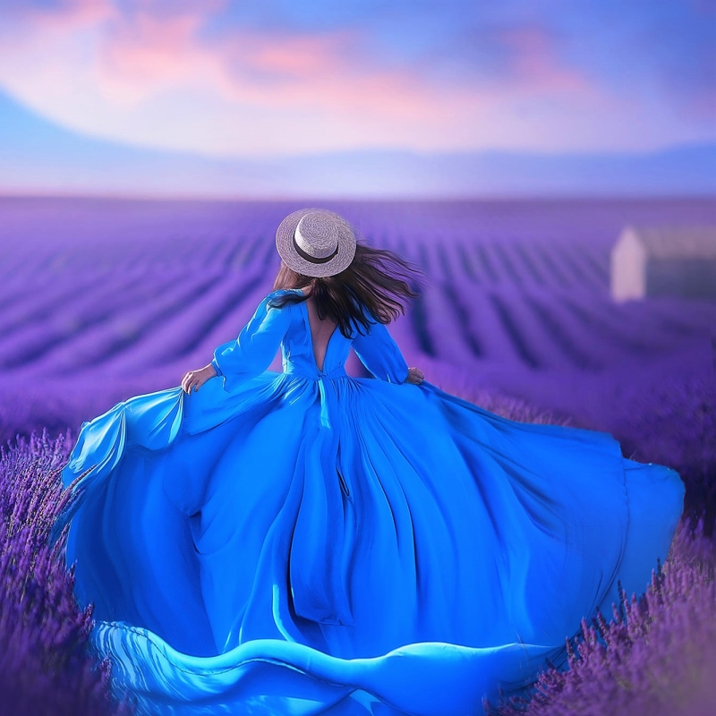 Woman Running through Lavender Fields by Irina Nedyalkova