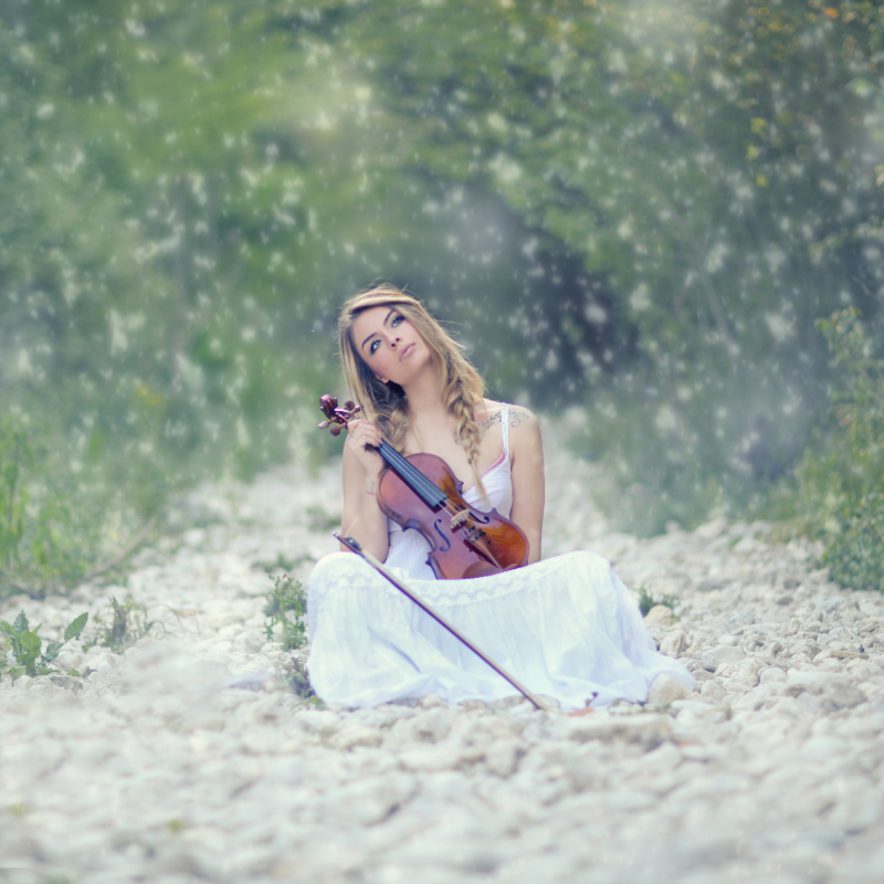 Model sitting with a violin by Alessandro Di Cicco