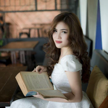 book brown eyes brunette white dress model woman asian PFP