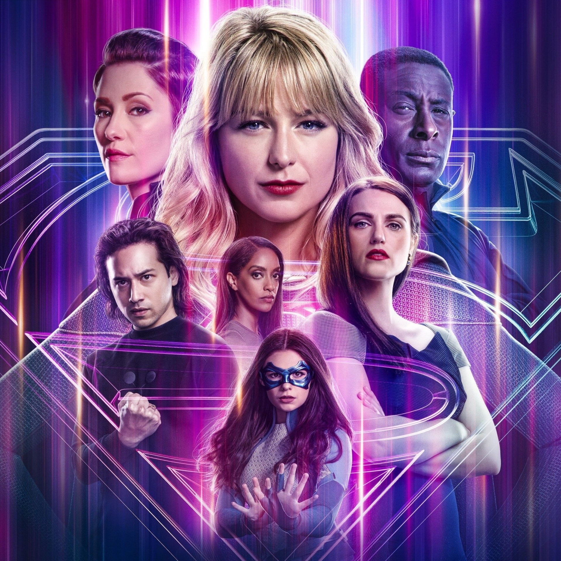 Forum avatar/profile photo inspired by the Supergirl TV show: Supergirl centered with teammates against a neon purple-pink backdrop and S emblem.