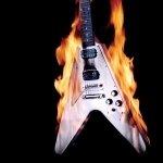 Music-themed forum avatar/pfp: a V-shaped electric guitar engulfed in flames against a dark background.