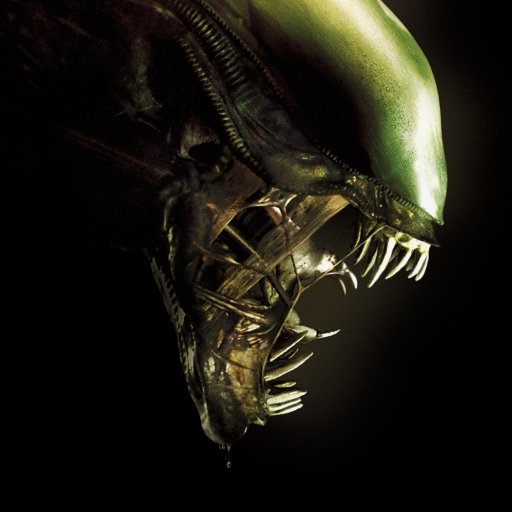 Forum avatar/pfp: close-up of a movie alien's glossy elongated skull and exposed double jaw, fanged maw lit against a dark background.