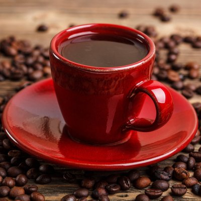 Forum avatar/pfp: red coffee cup and saucer filled with dark coffee, surrounded by scattered coffee beans — food, coffee.