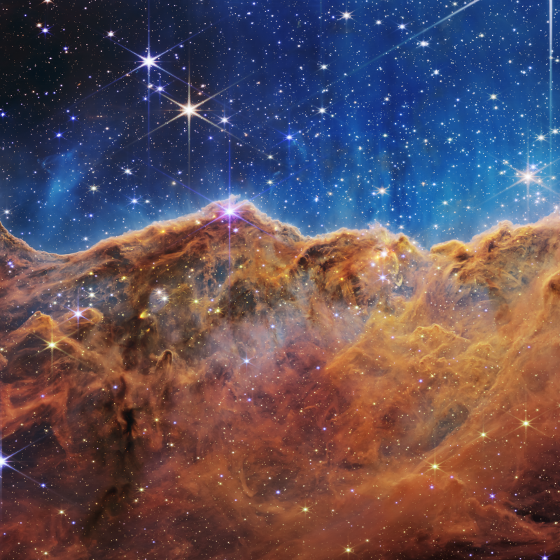 “Cosmic Cliffs” in the Carina Nebula by James Webb