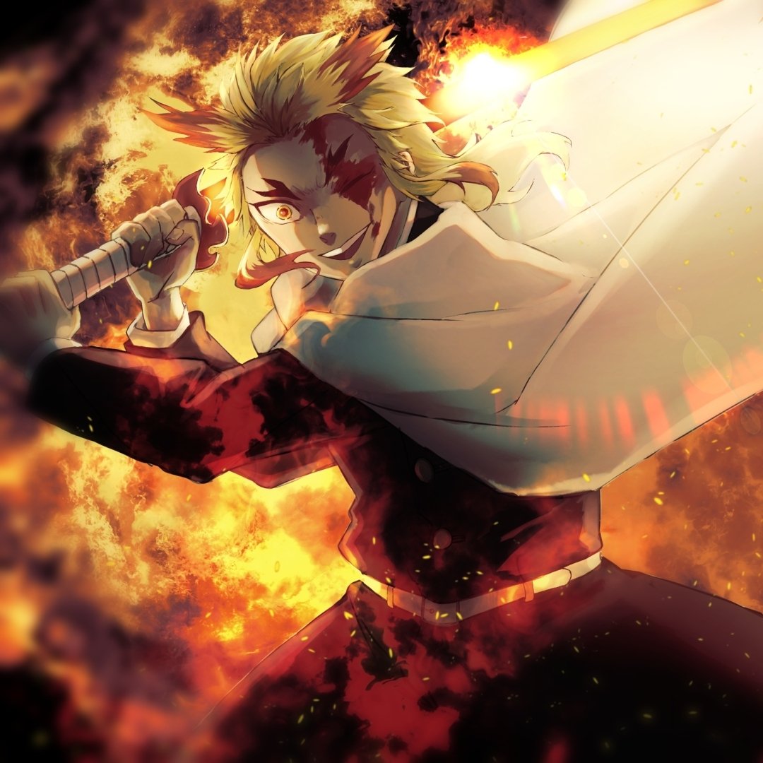 Forum avatar of Kyojuro Rengoku from Demon Slayer: Kimetsu no Yaiba — fiery battle pose, sword raised, white cape billowing amid roaring flames.