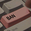 Close-up of a keyboard with a prominent BAN key for a user's avatar or profile picture, symbolizing moderation or control.