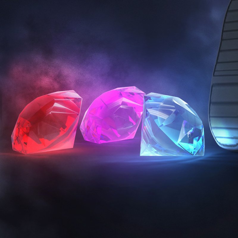 Forum avatar showing three glowing Chaos Emeralds (red, magenta, blue) from the Sonic the Hedgehog movie on a dark, smoky background.