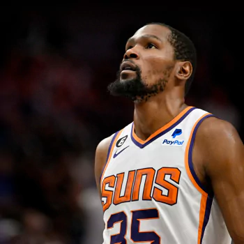 Profile photo featuring Phoenix Suns NBA player Kevin Durant, looking upwards in his basketball jersey.