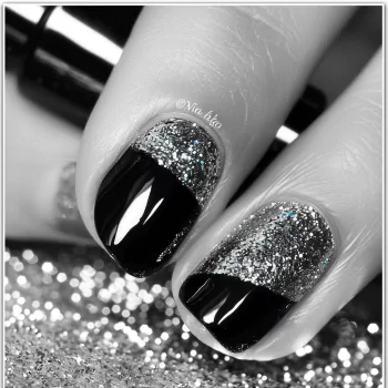 Black and silver glitter manicured nails, showcased in this forum avatar/profile photo.