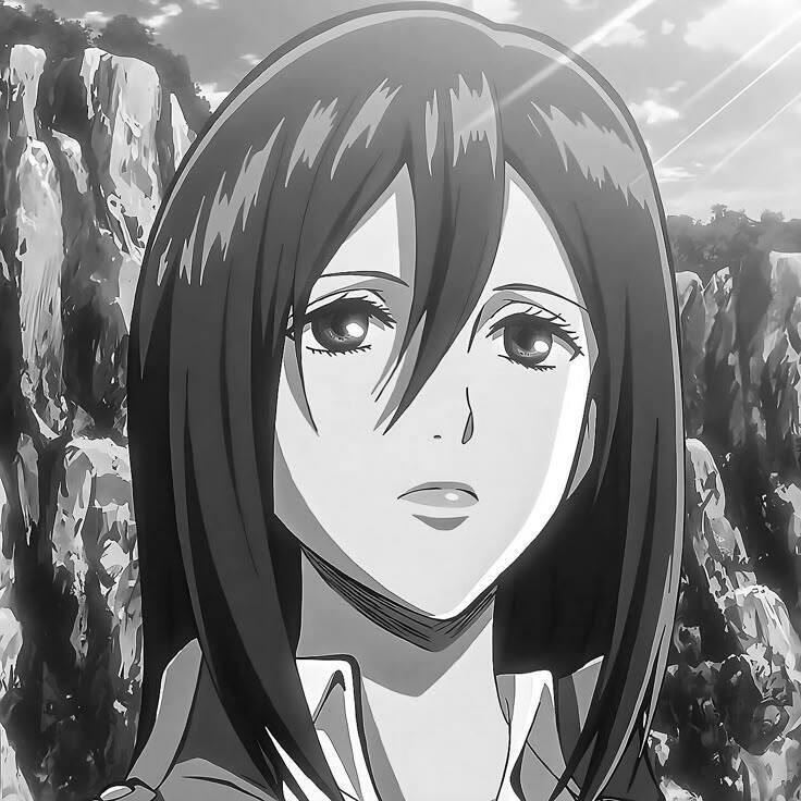Black-and-white profile image of Mikasa Ackerman from Attack on Titan, featuring her thoughtful expression against a backdrop of rocky terrain.