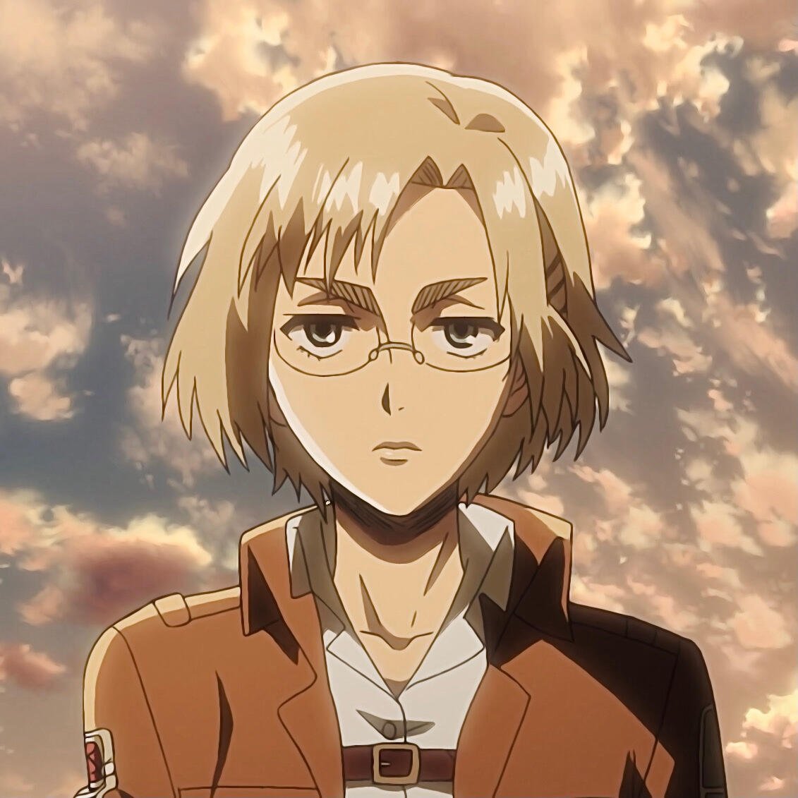 Anime-style profile photo featuring a character from Attack on Titan, with short light hair and glasses, set against a backdrop of a colorful sky.