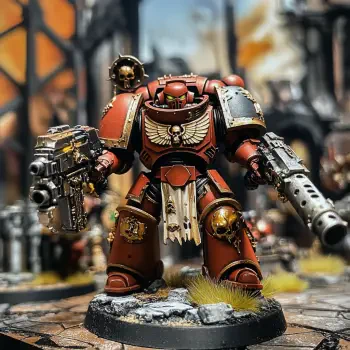 A detailed and vibrant Warhammer 40k avatar featuring a red-armored Space Marine wielding powerful weapons, set against a backdrop of intricate battle terrain.