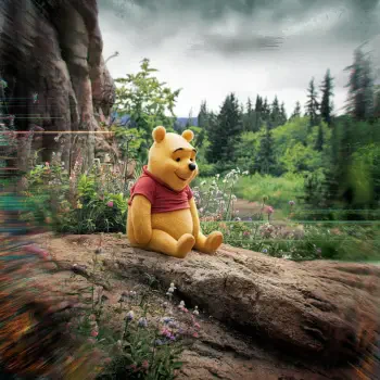 A cheerful Winnie the Pooh sits on a rock amidst a lush green landscape, surrounded by wildflowers, making for a delightful forum avatar.