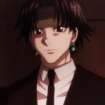 Anime-style close-up of Chrollo Lucilfer from Hunter x Hunter, featuring him with dark hair, headband, and earrings, dressed in a suit and tie against a dark background.