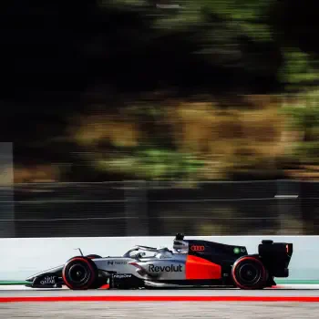 Forum avatar/profile photo of an Audi F1 race car racing on track, silver-and-black livery with red accents and Revolut sponsorship.
