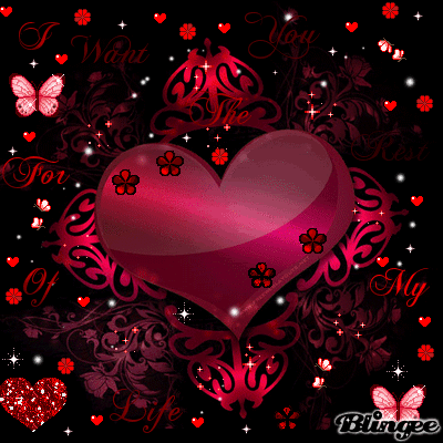 Glittering artistic forum avatar: glossy pink heart with floral accents, tiny hearts, butterflies and sparkles on an ornate dark background — a love-themed profile picture.