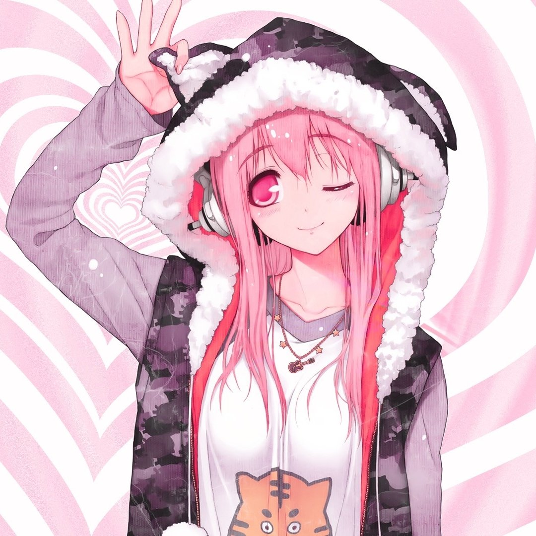 Anime-style avatar of Super Sonico with pink hair, headphones, a blush, and a wink, wearing a hoodie and making a peace sign against a pink heart background.